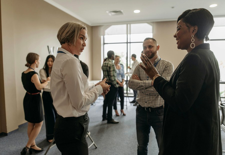 Professionals networking at business event